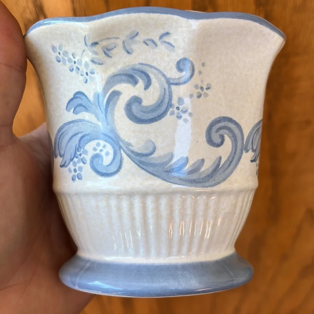 Spring maid tooth brush holder